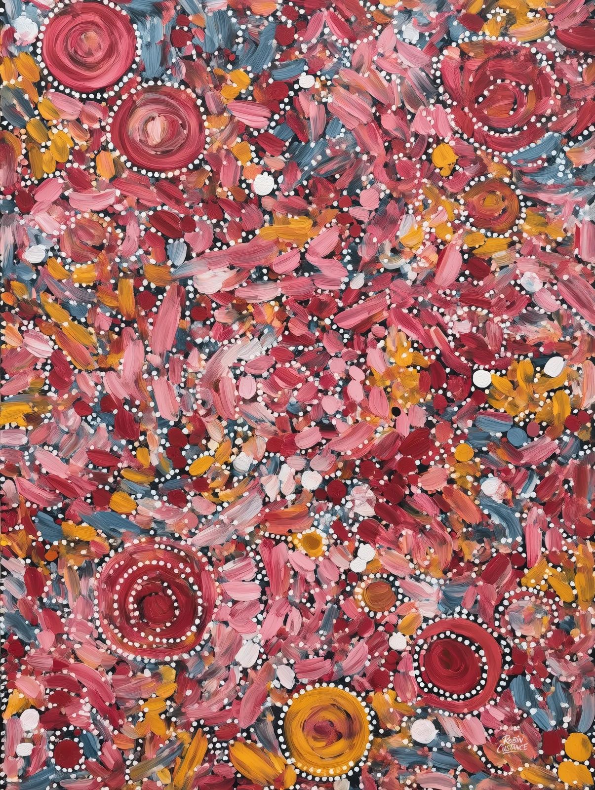 Pink, crimson, orange and gray brush-like marks tumble across this vertical abstract, interrupted by concentric circles and fine white dot-style detail.