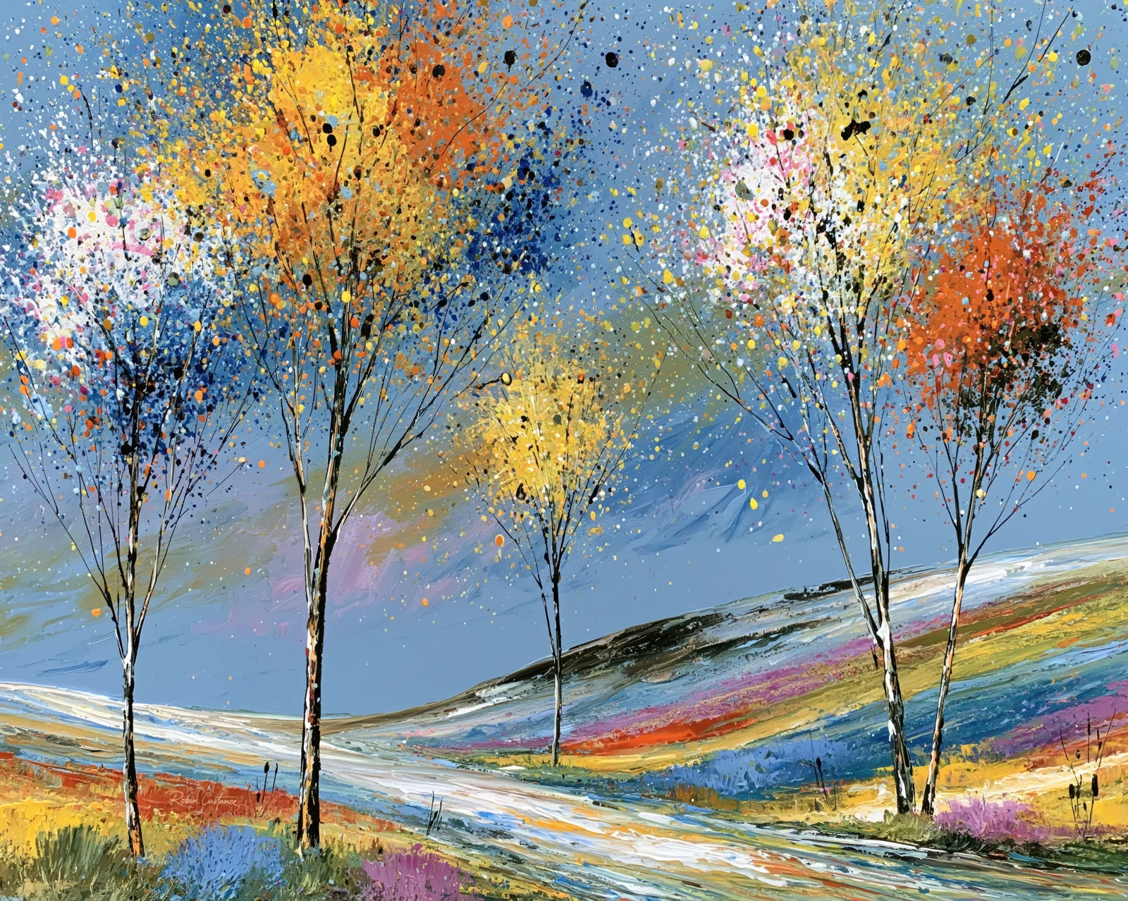 Slender dark trees with scattered yellow, orange, white and blue canopies above sweeping coloured bands of hillside under a clear blue background.