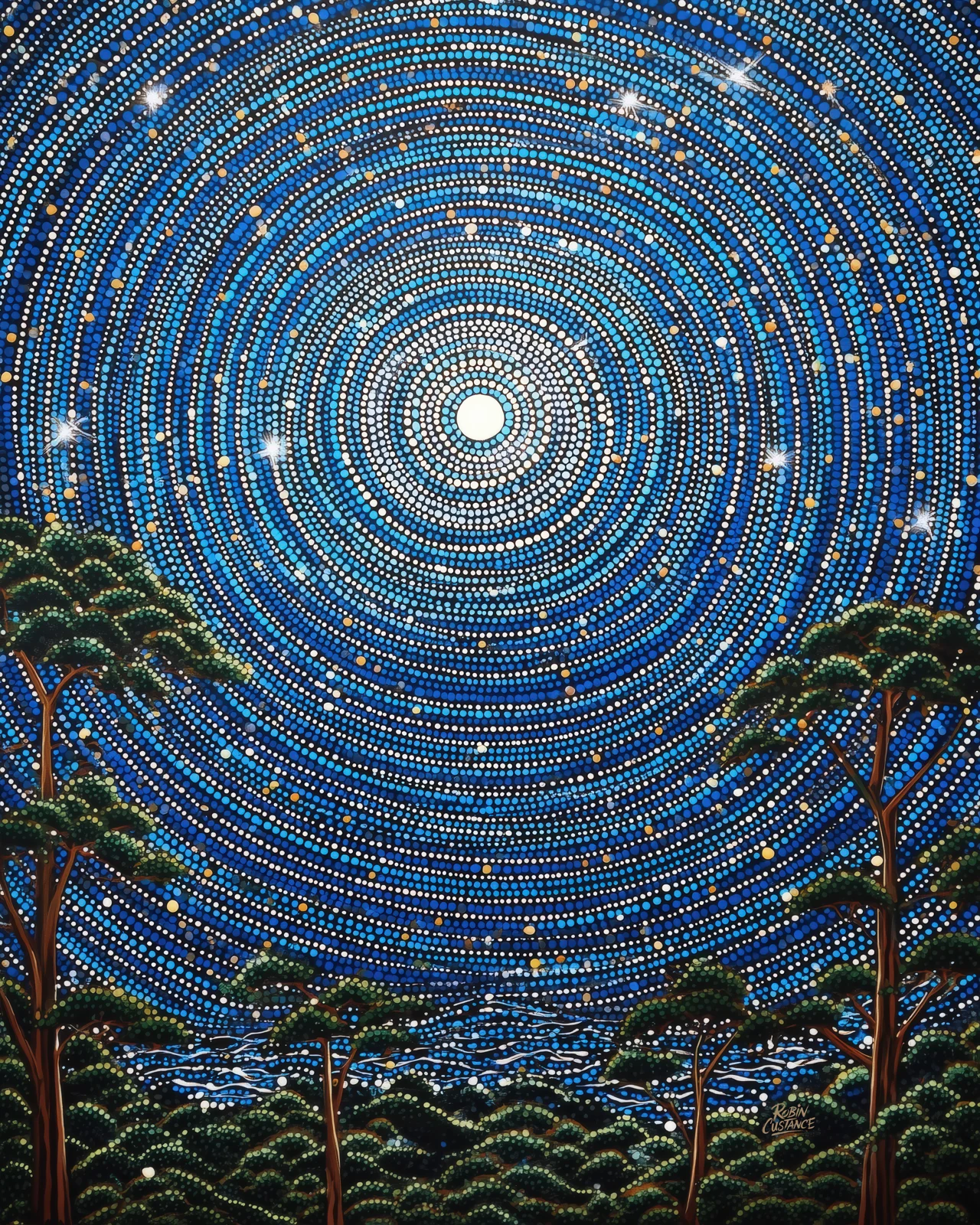 Dark tree silhouettes rise beneath a vast blue star field built from concentric rings of tiny light, all circling a bright central glow.
