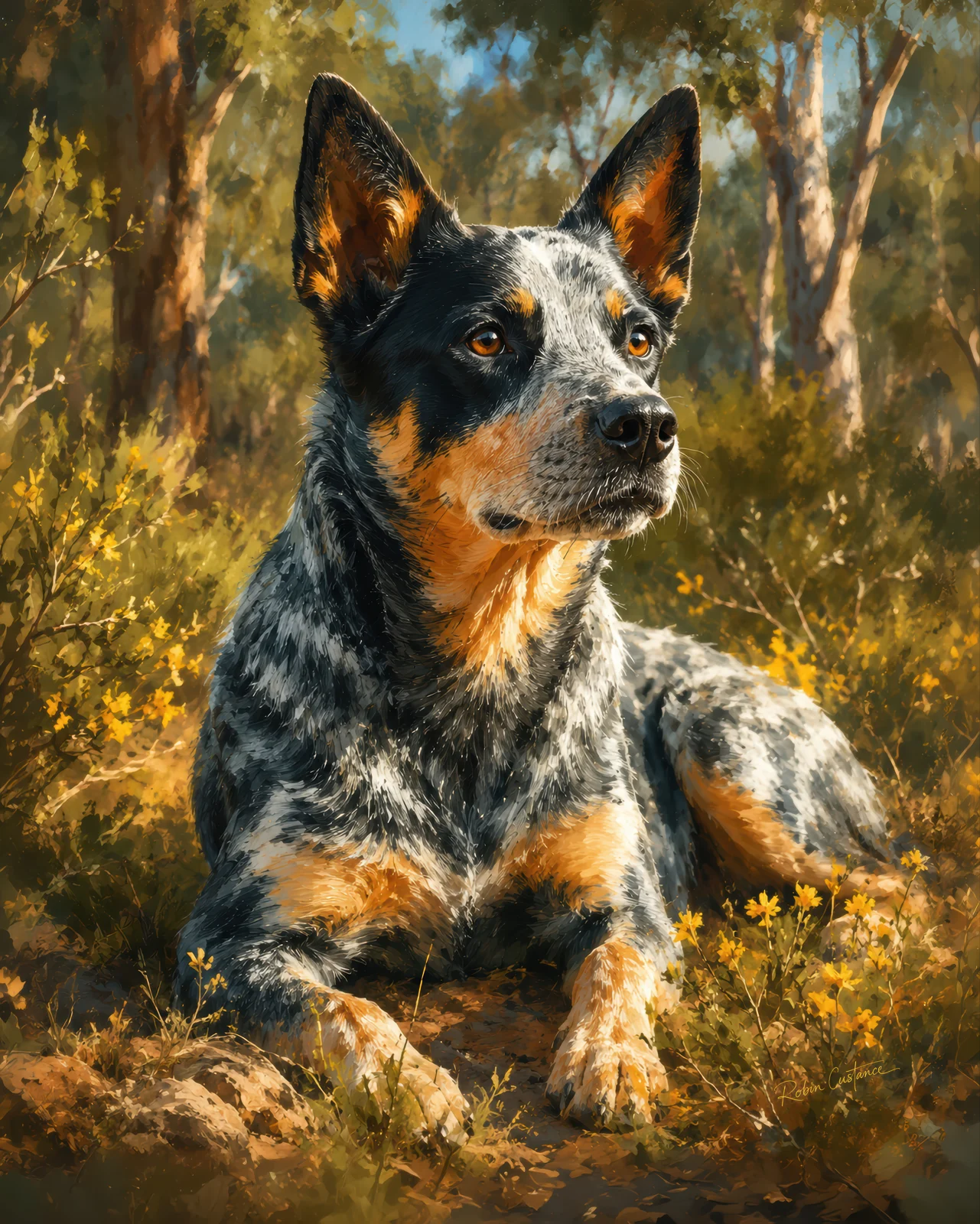 Blue Heeler resting among yellow flowers with upright ears, amber eyes, a speckled black-silver coat and tan paws, against sunlit trees.
